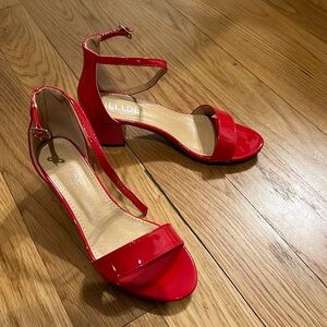 Hardly worn cherry red patent leather Illude